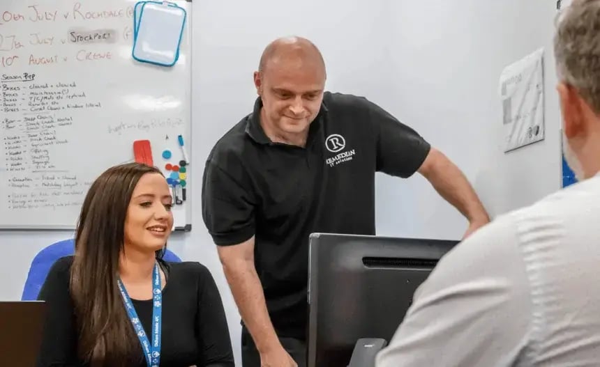 Remedian IT escalation specialists supporting school staff at the helpdesk