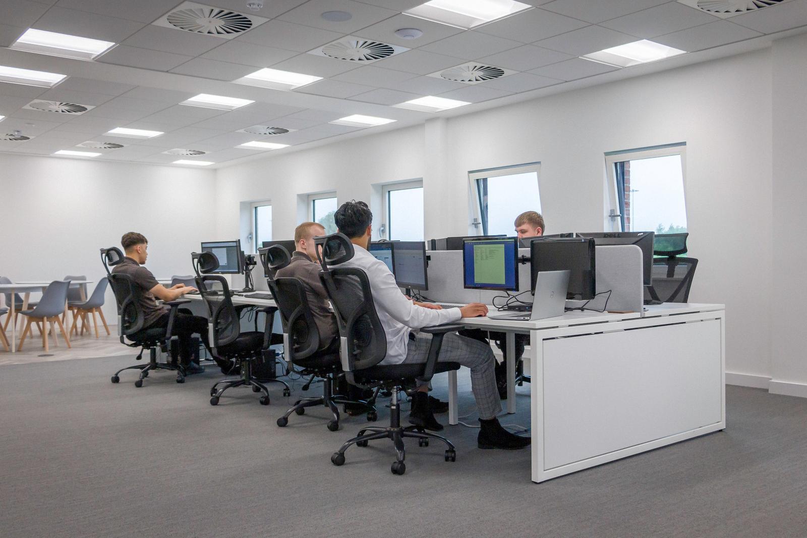 IT professionals at Remedian delivering managed IT services for companies in Oldham